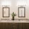 a bathroom with a sink toilet and a mirror