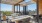 a rooftop terrace with seating and views